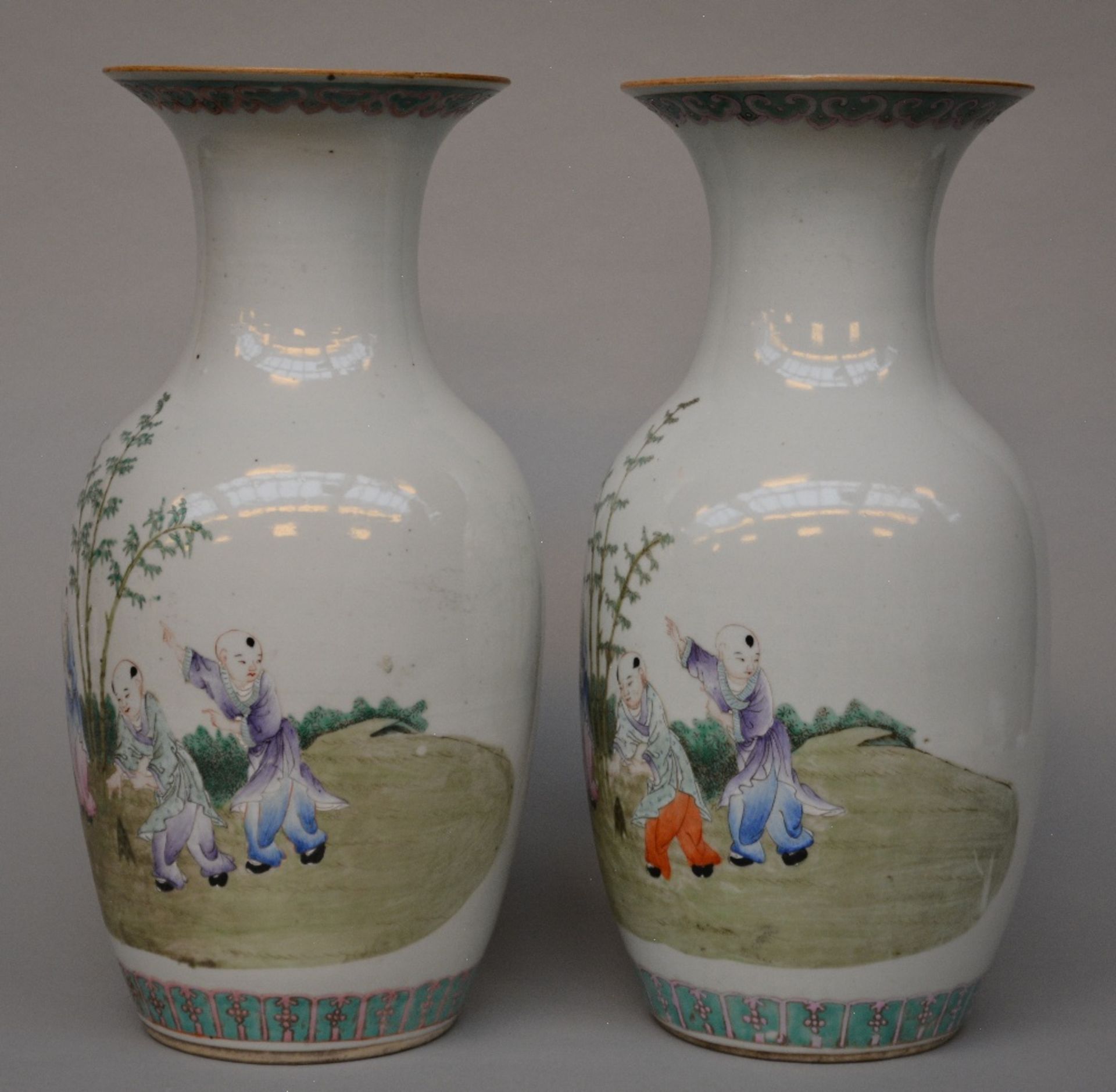 A pair of Chinese polychrome decorated vases depicting children playing in a garden, marked, - Bild 2 aus 7