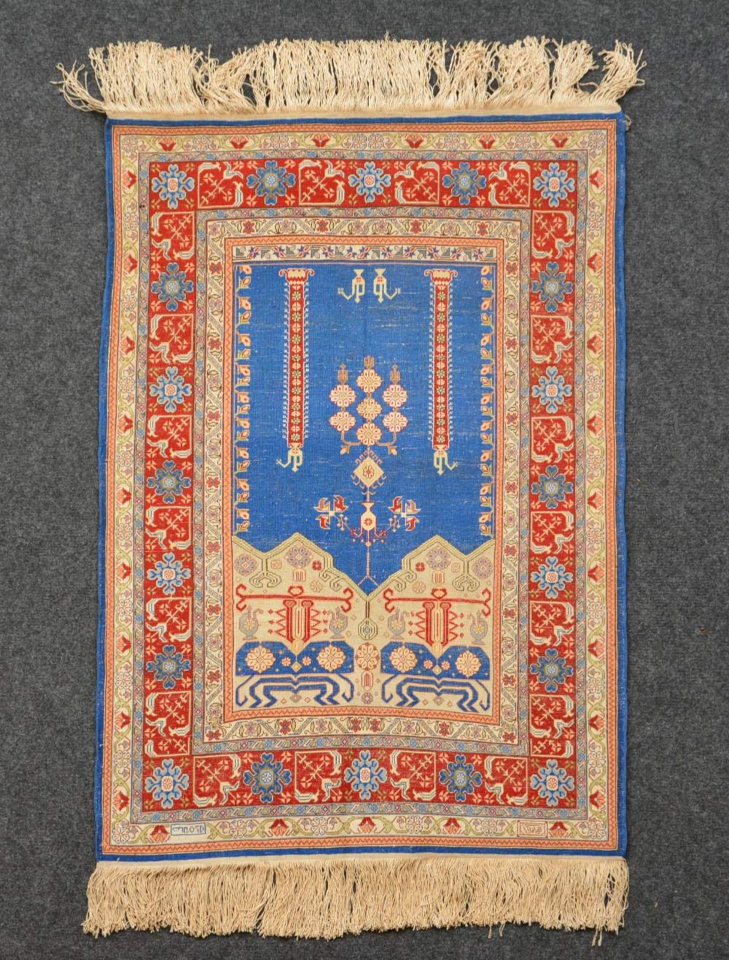An Oriental rug, 63,5 x 91 cm - Bild 2 aus 2
