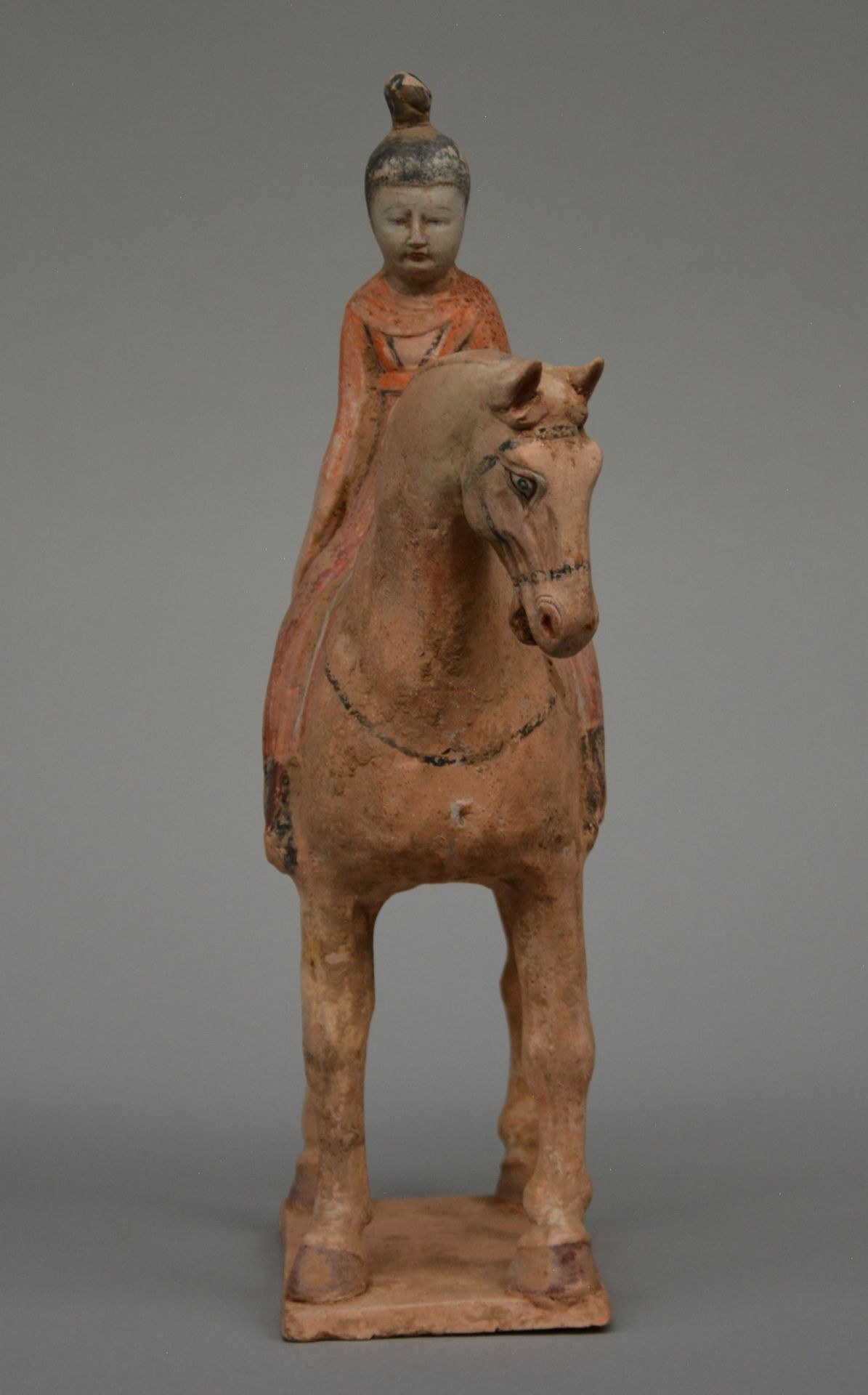 A Chinese earthenware figure of a horse rider, with traces of polychrome, Tang dynasty (618-906), - Bild 4 aus 7