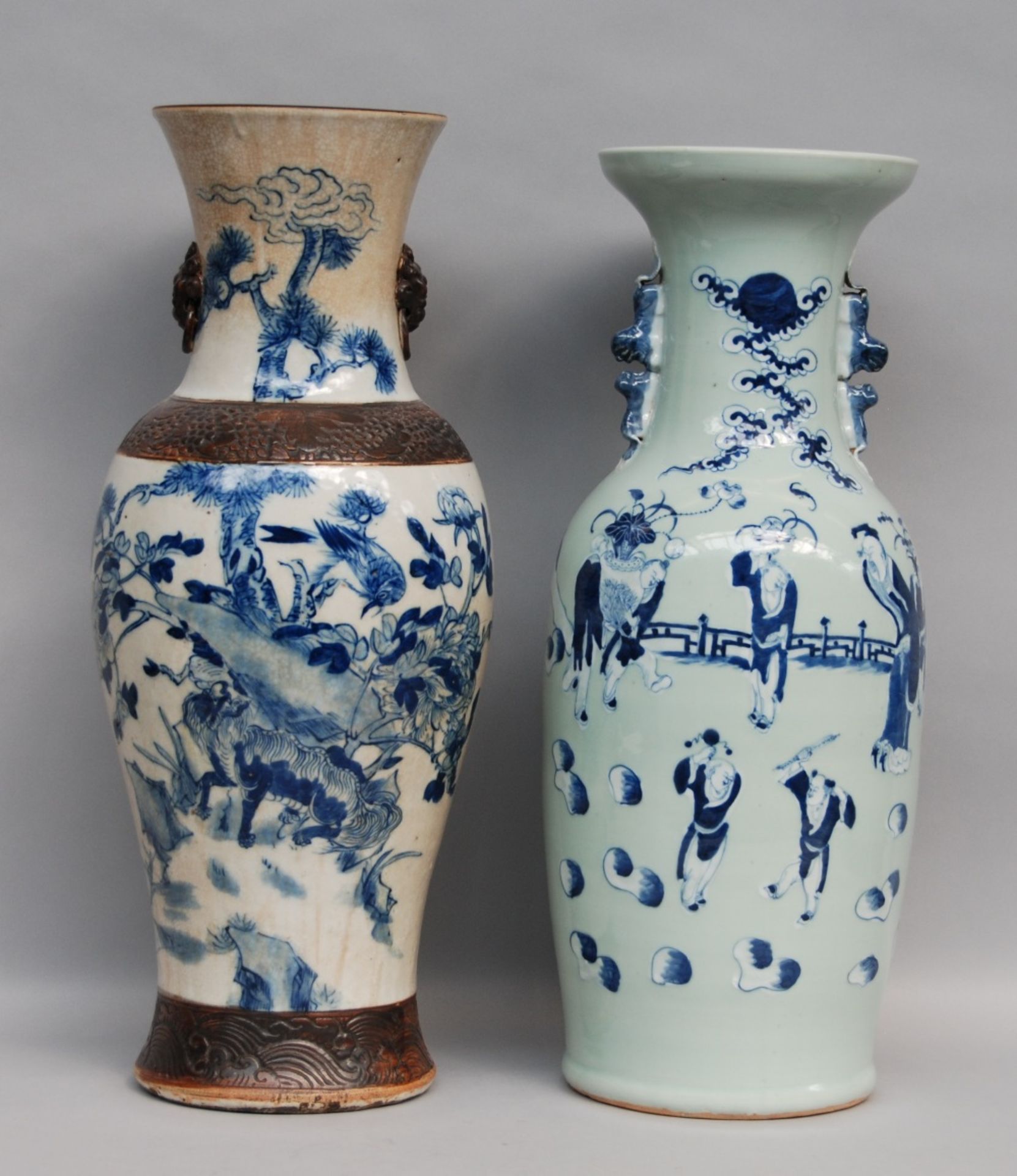 Two Chinese blue and white vases, 19thC, H 59,5 (crack in the bottom) - H 61,5 cm