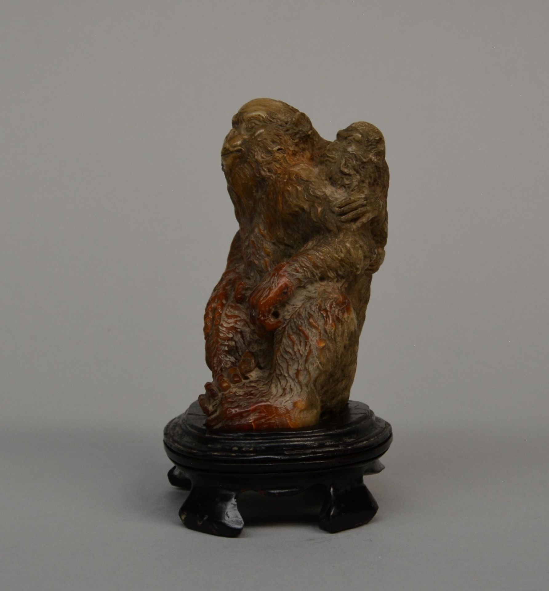 A Japanese group of a mother monkey with baby in brown-beige tinted igneous rock on a wooden base, - Image 2 of 7