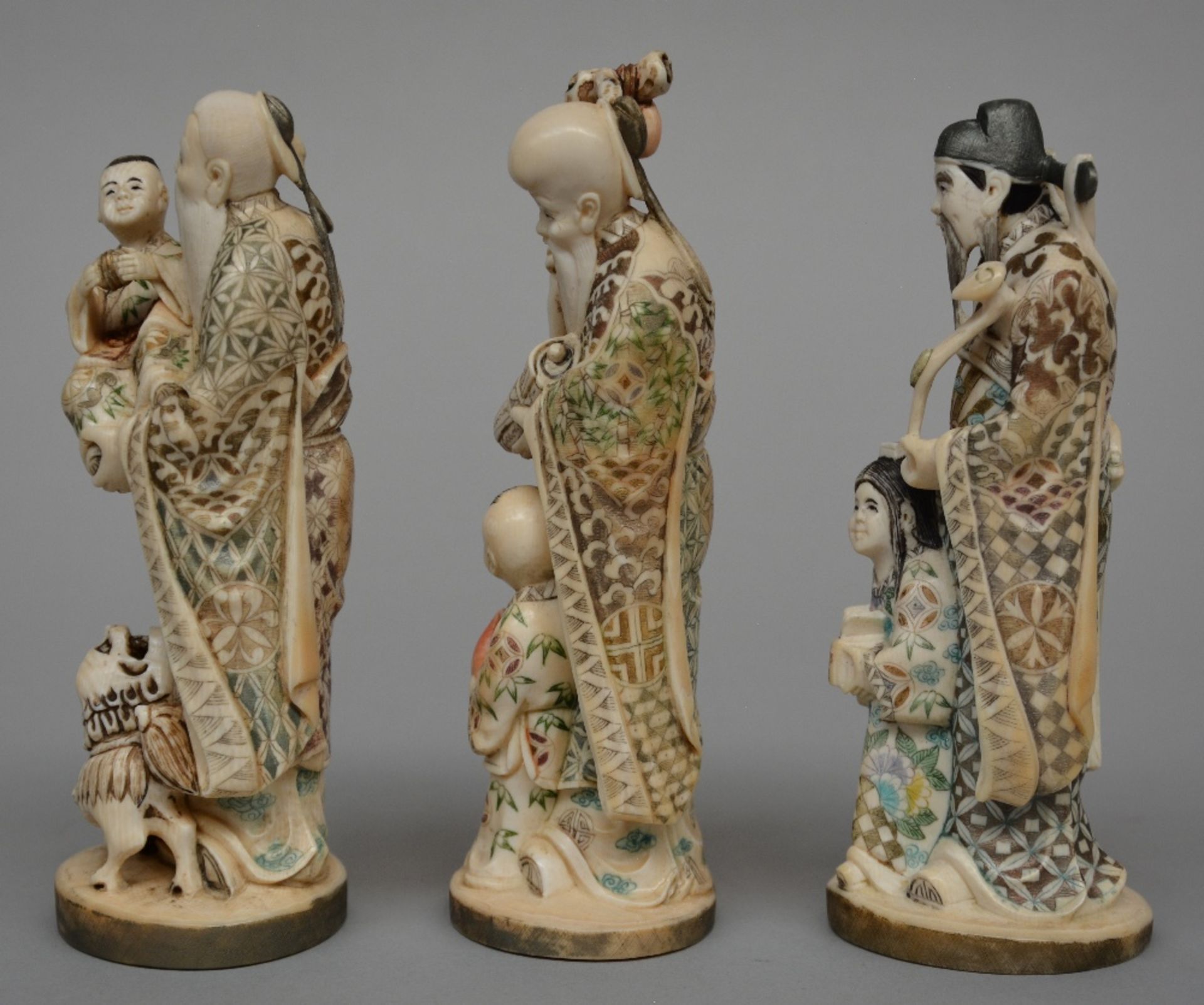 Three Japanese ivory okimono of mythological figures, scrimshaw decorated and partially - Image 2 of 7