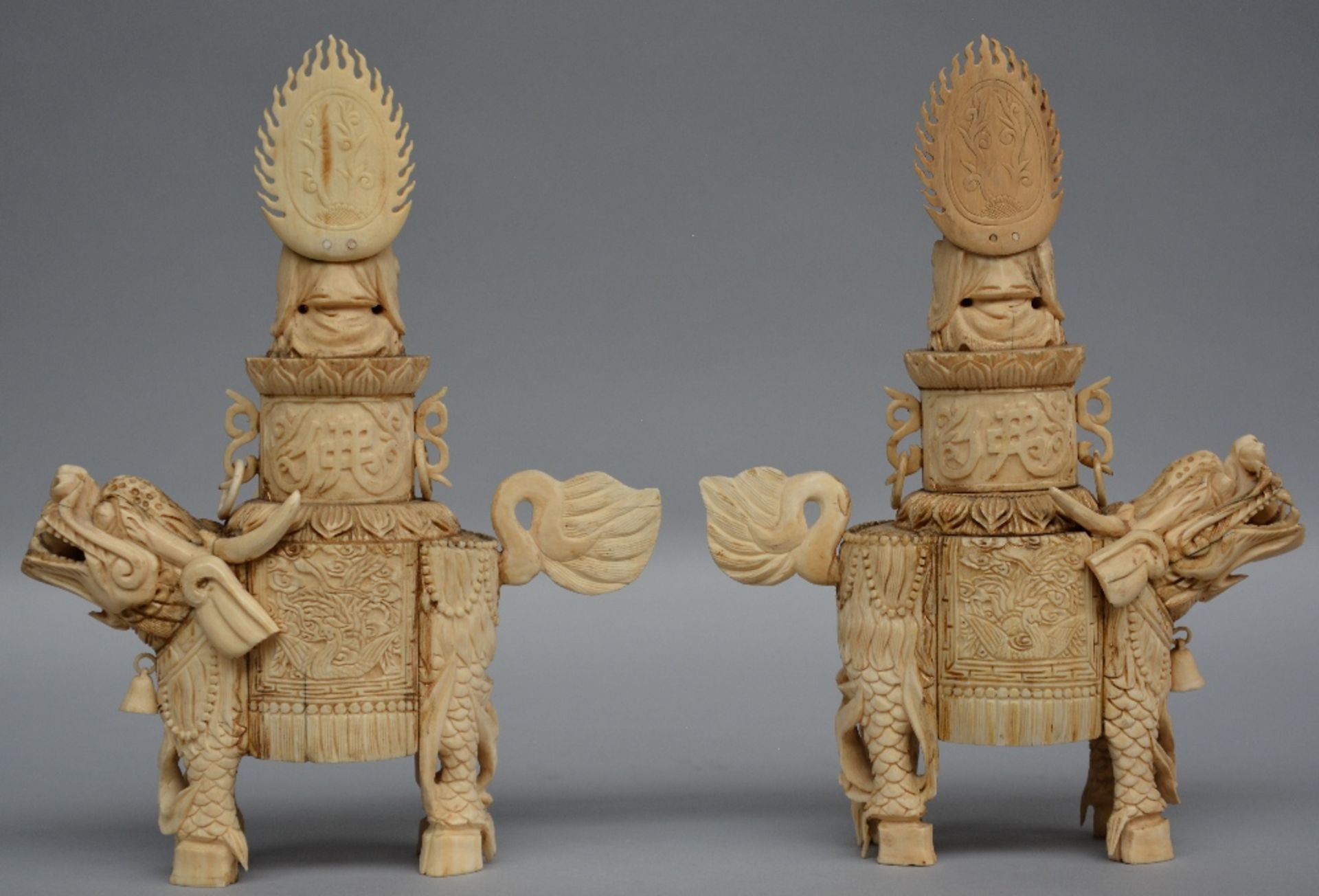 A pair of bone sculptures of Buddha sitting on a Qilin, first half of 20thC, H 26 cm - Bild 3 aus 12