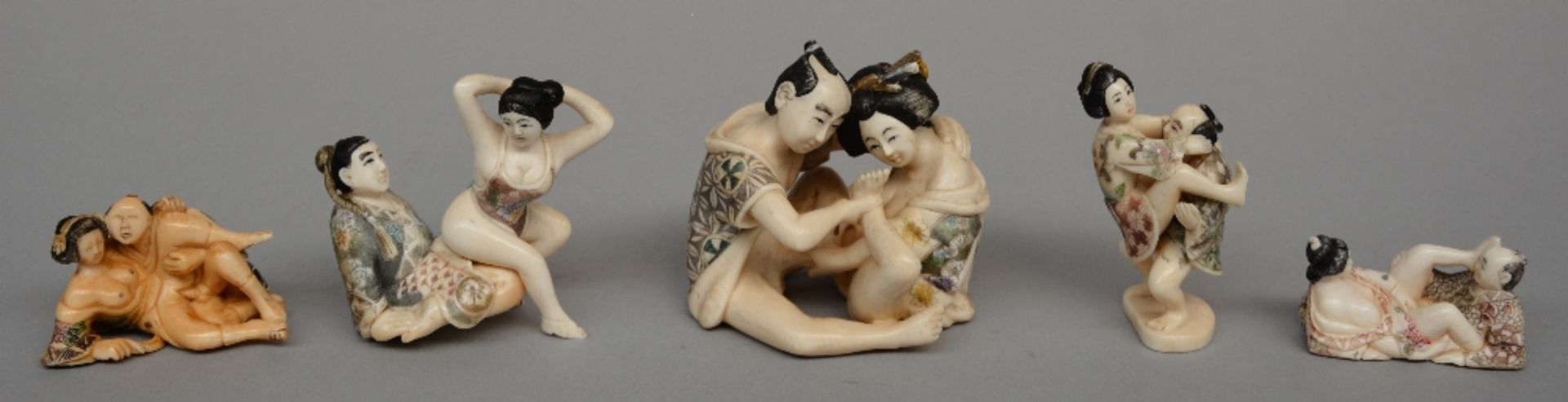 Five ivory erotic sculptures, Japanese style, scrimshaw decorated, first half of 20thC, H 3 - 7