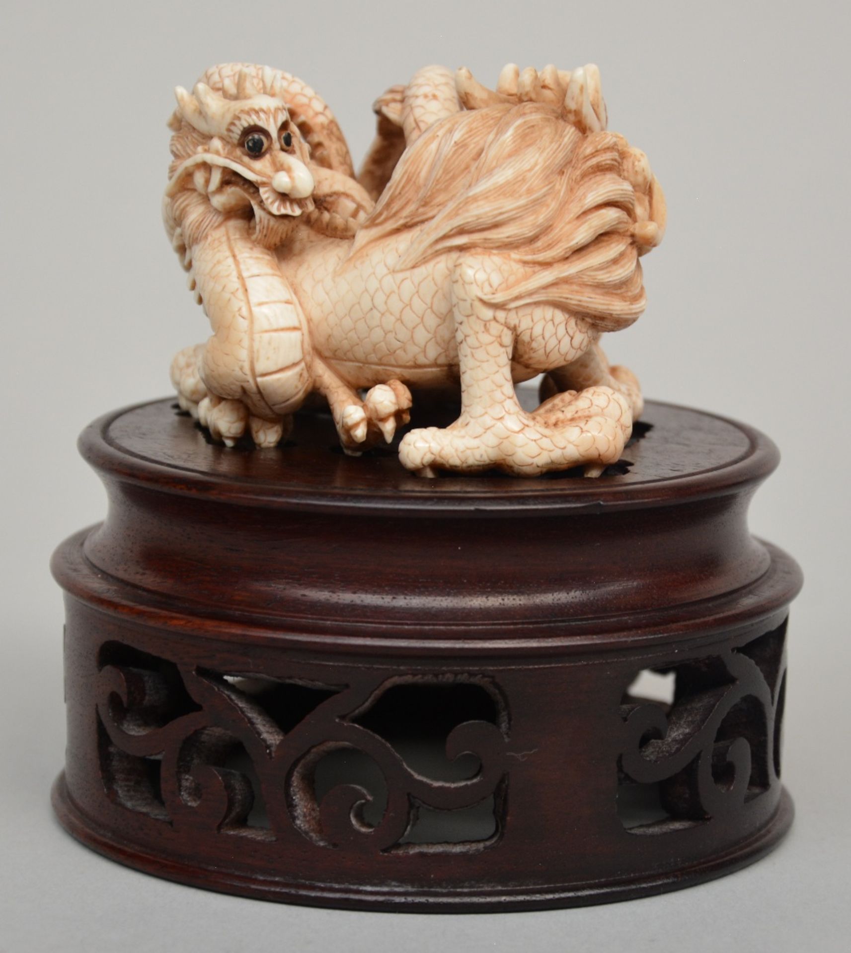 An Oriental ivory group of playing dragons on a wooden base, scrimshaw decorated, H 6 cm (without - Image 4 of 7