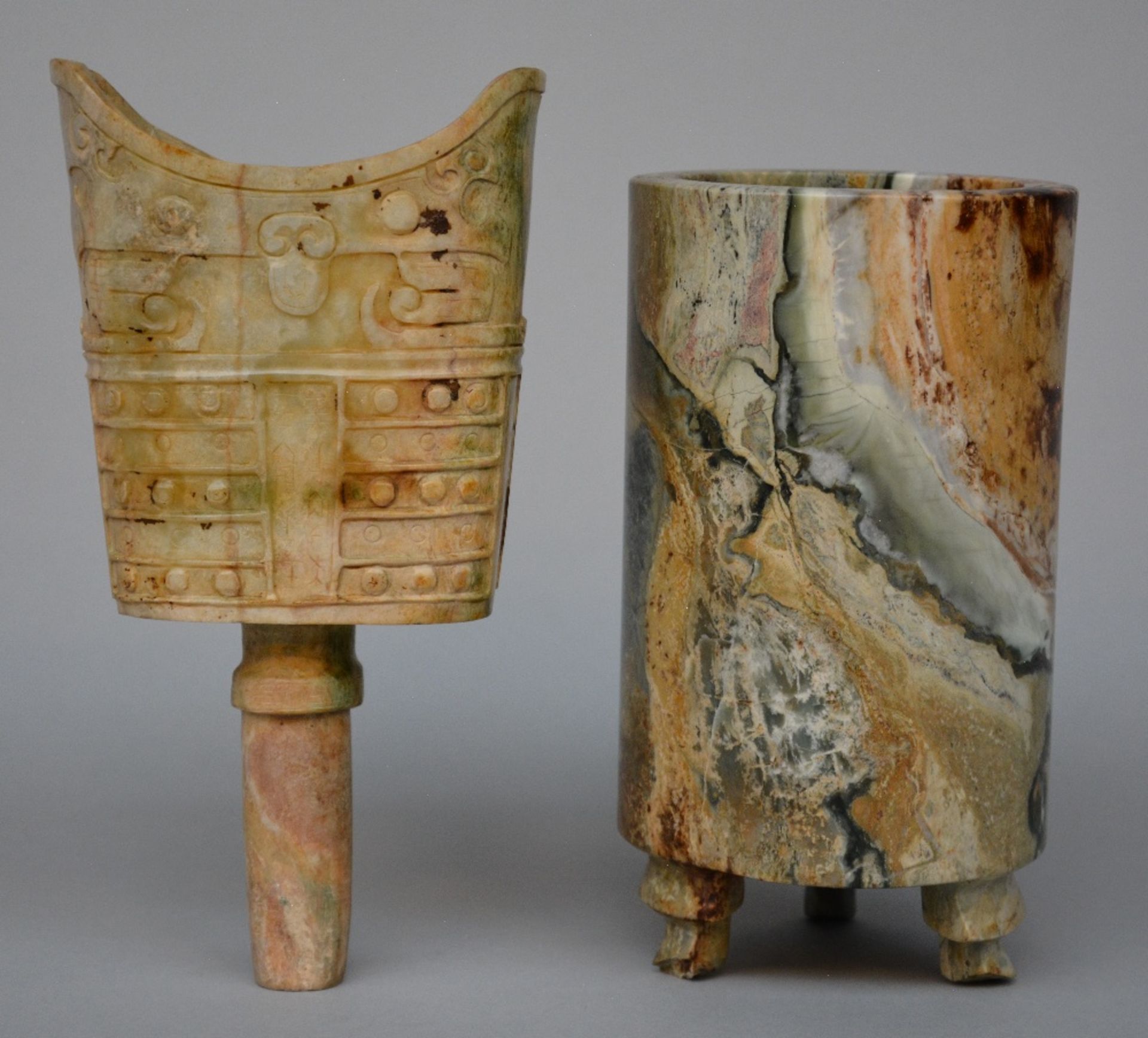 A late 19thC Chinese marble brush pot and ritual bell, H 18,5 - 21 cm (two feet of the brush pot