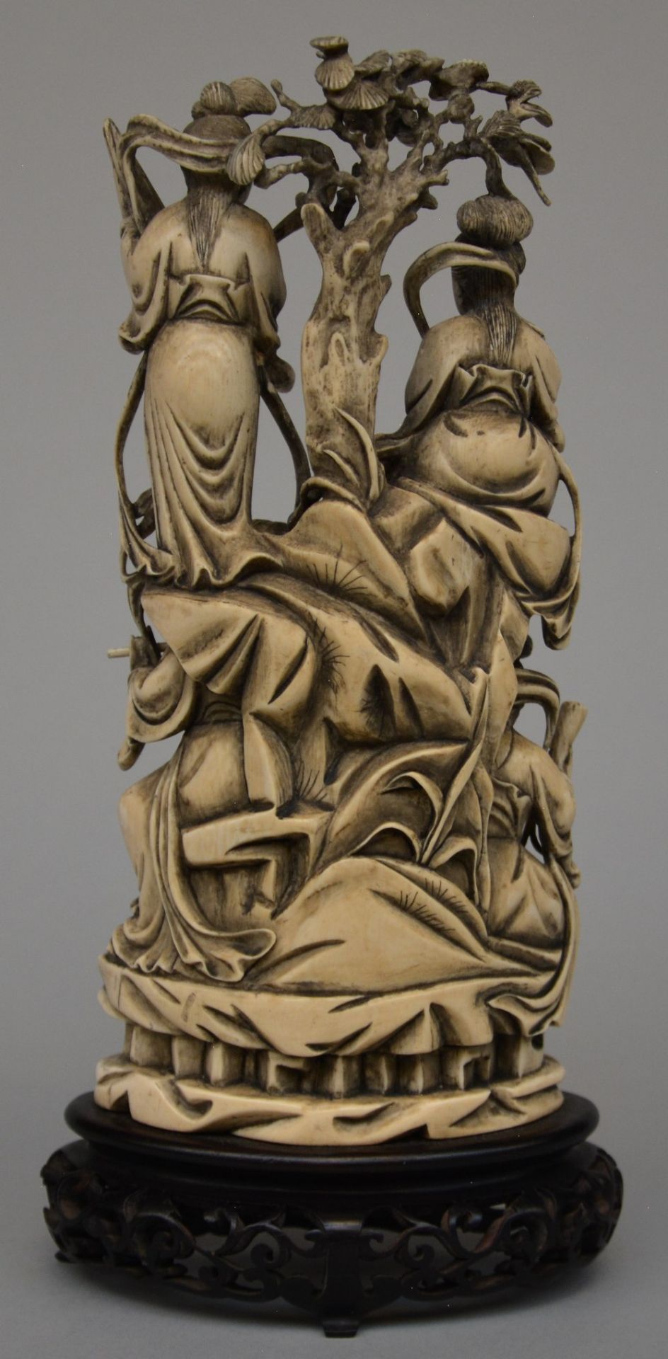 A Chinese ivory sculpture carved with ladies playing music in a landscape, on a fixed wooden base, H - Bild 2 aus 4