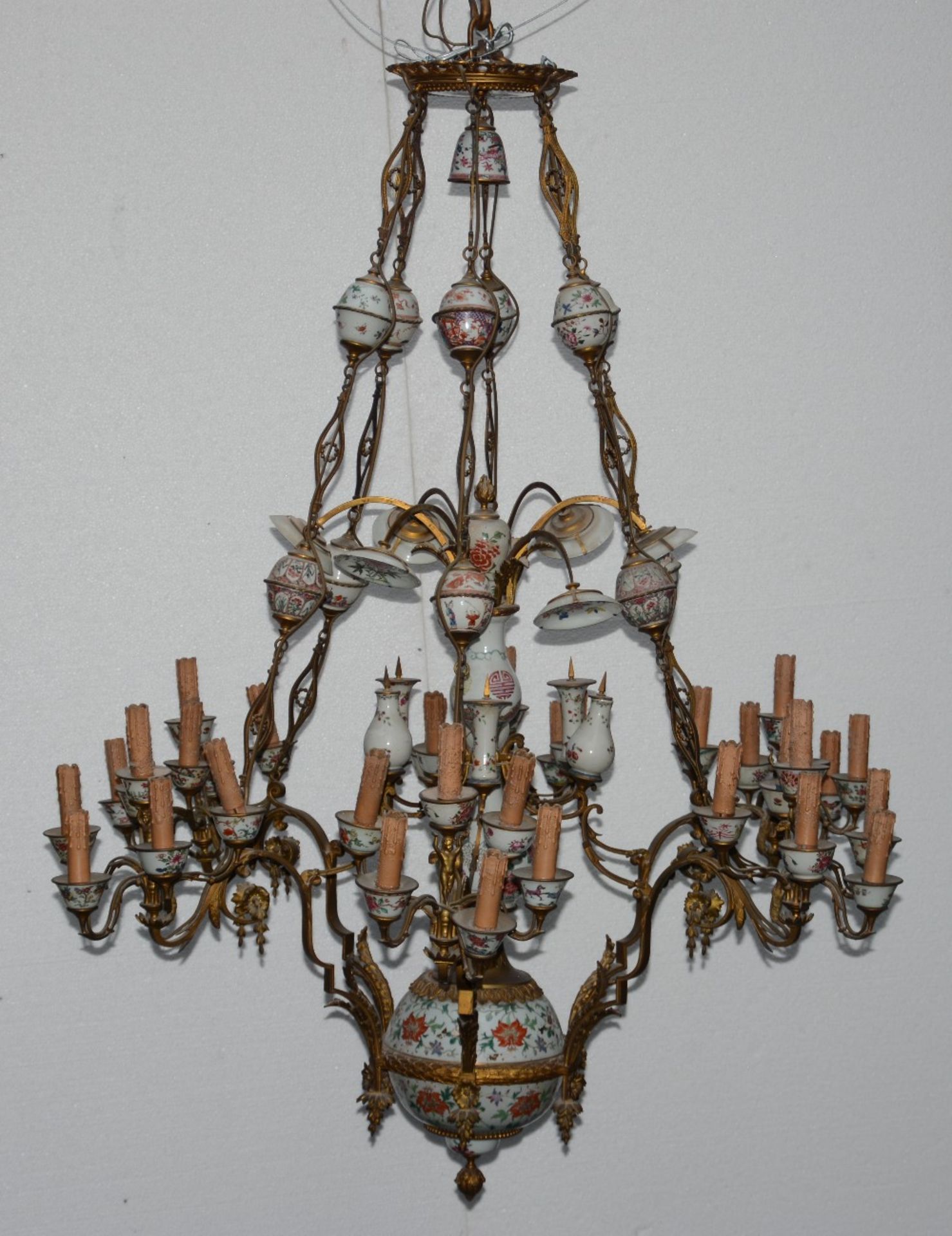 A rare late 19thC chandelier with Neo-classical bronze mounts, integrated with mid-18thC Chinese