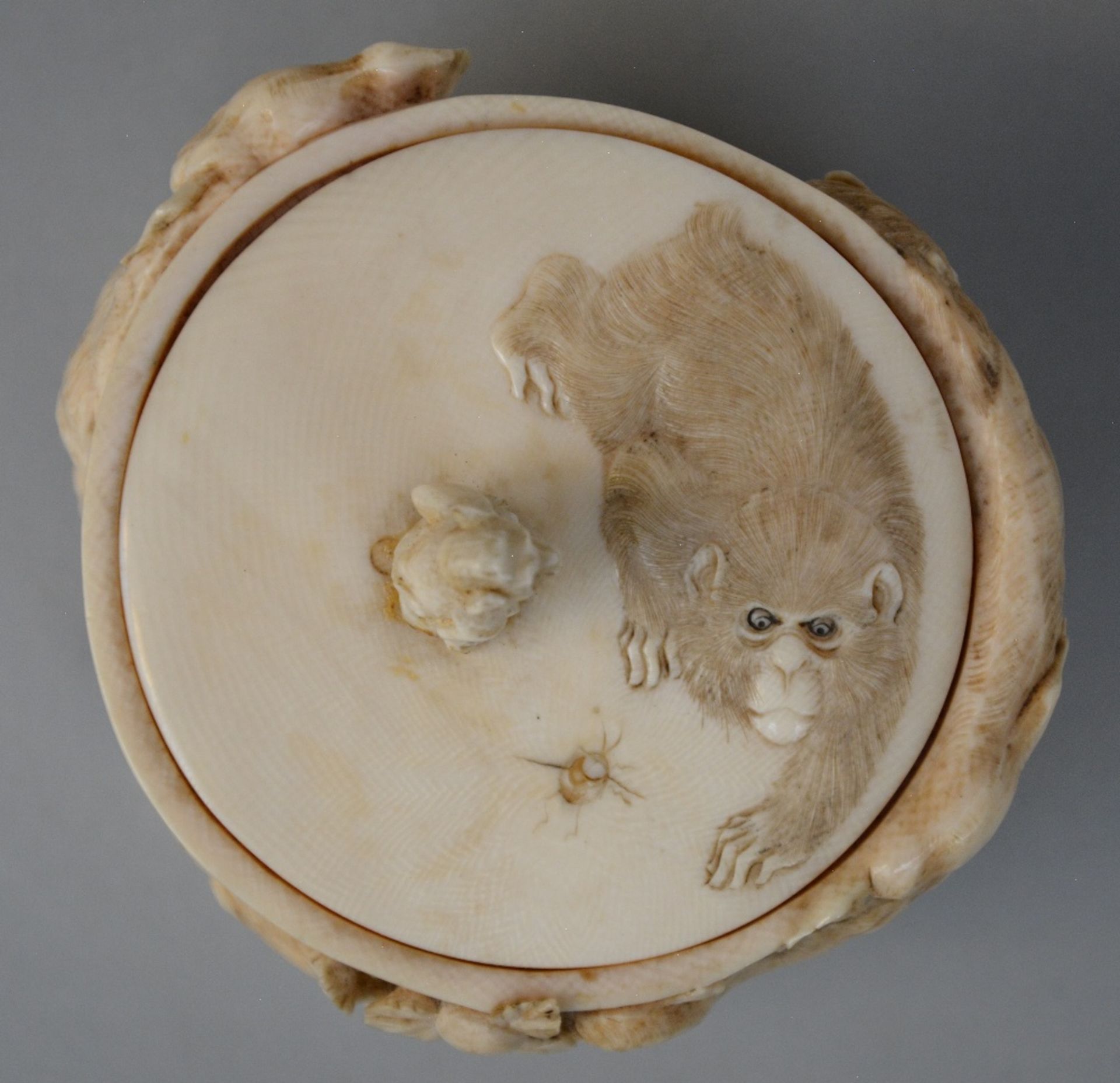 A Japanese ivory okimono of a man holding a lantern and stepping on a toad, scrimshaw decorated, - Image 5 of 7