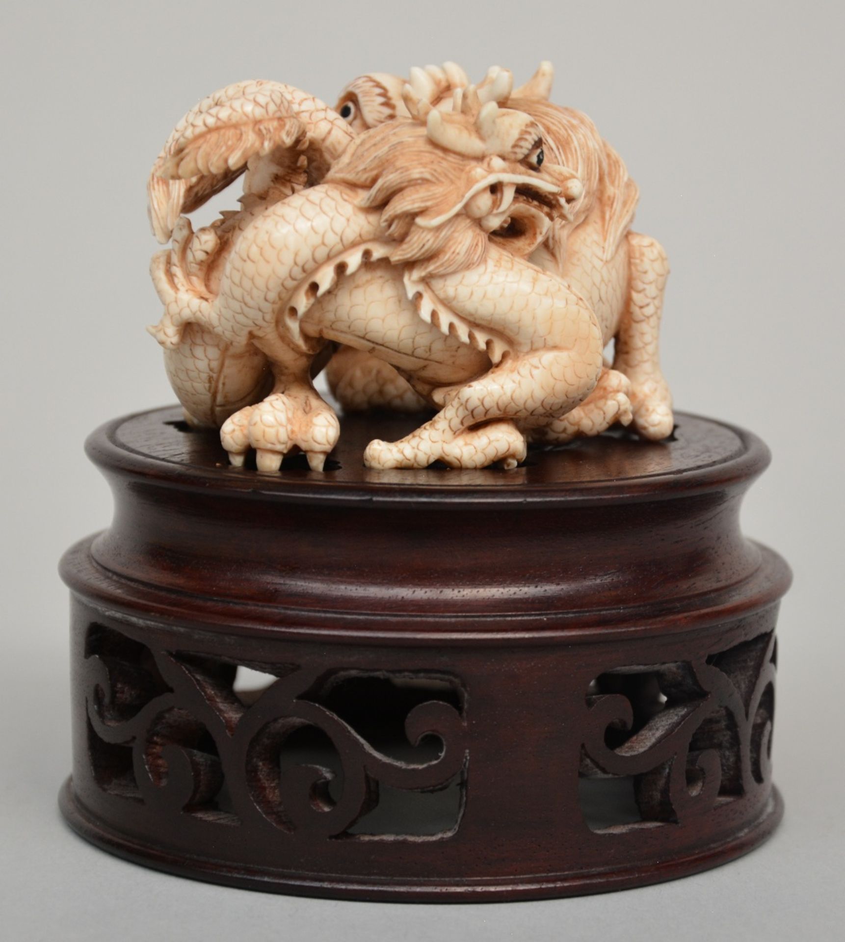 An Oriental ivory group of playing dragons on a wooden base, scrimshaw decorated, H 6 cm (without - Image 3 of 7