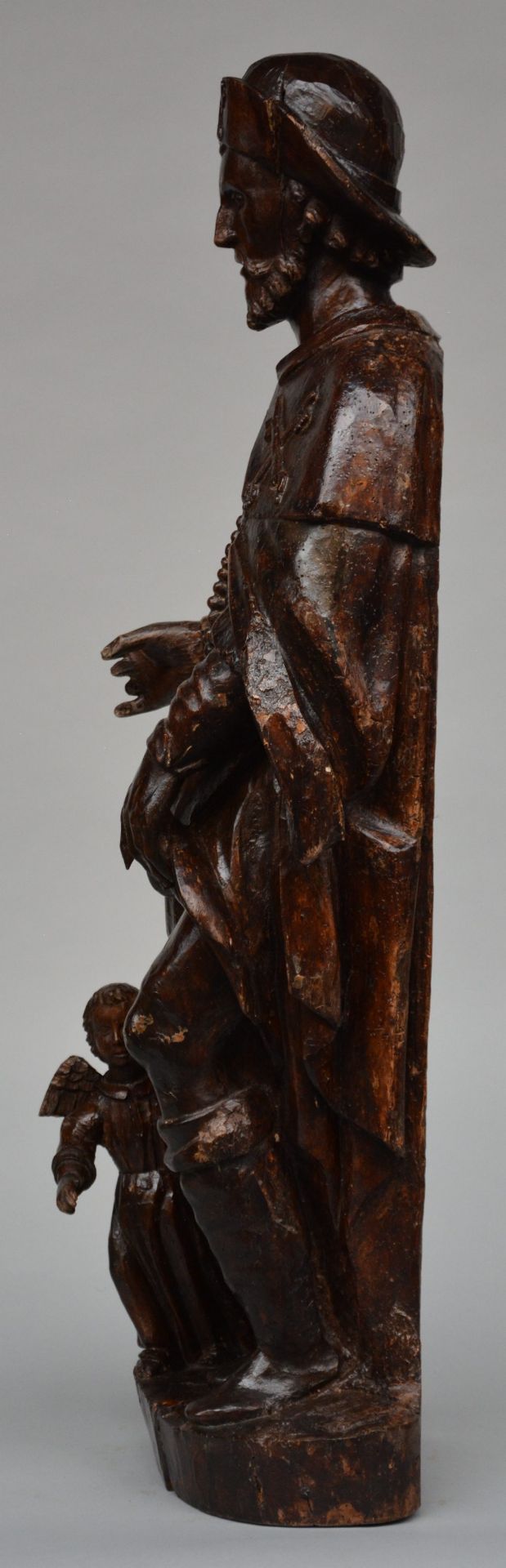 A walnut carved figure of Saint Roch, 18thC, H 92,5 cm (damage and restoration) - Bild 2 aus 4