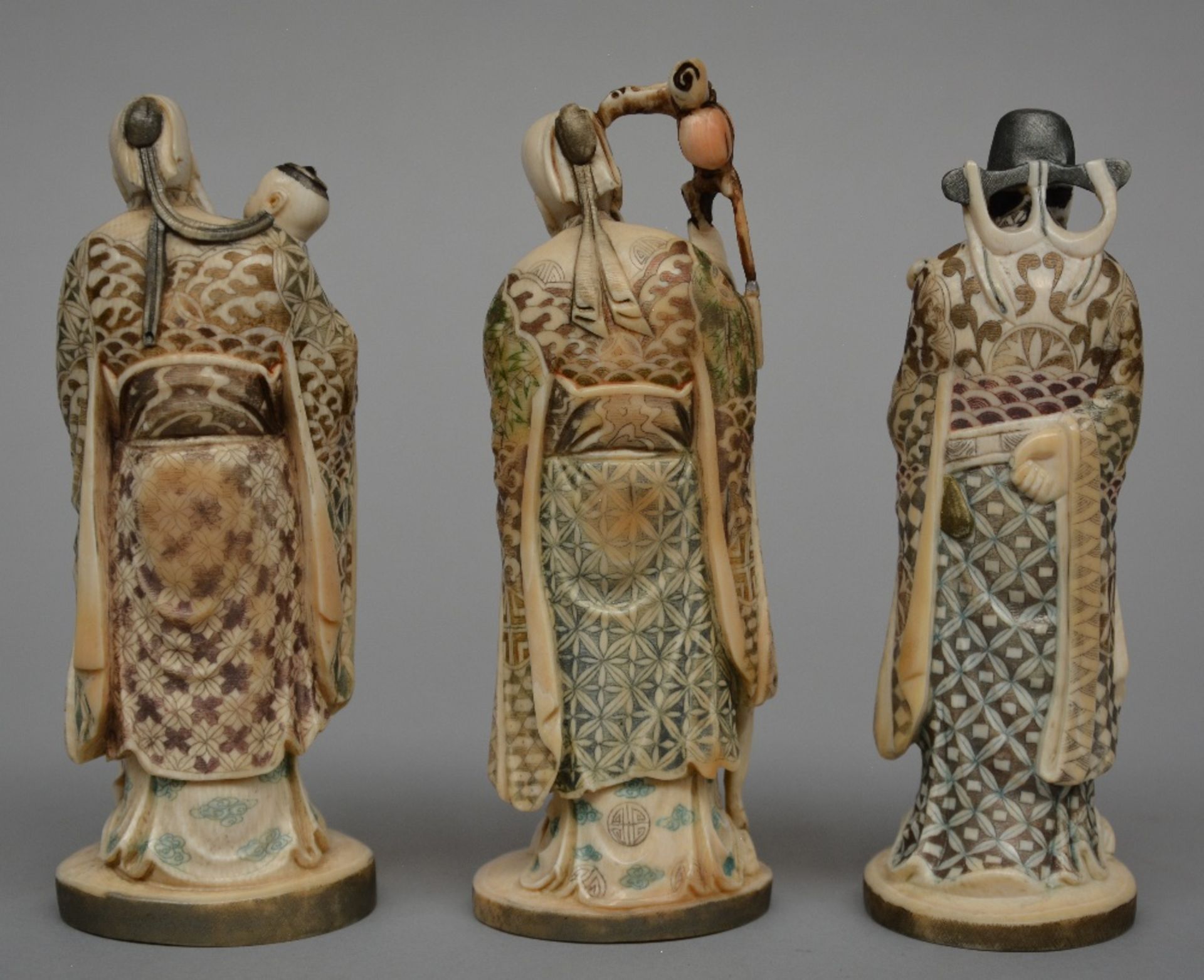 Three Japanese ivory okimono of mythological figures, scrimshaw decorated and partially - Image 3 of 7