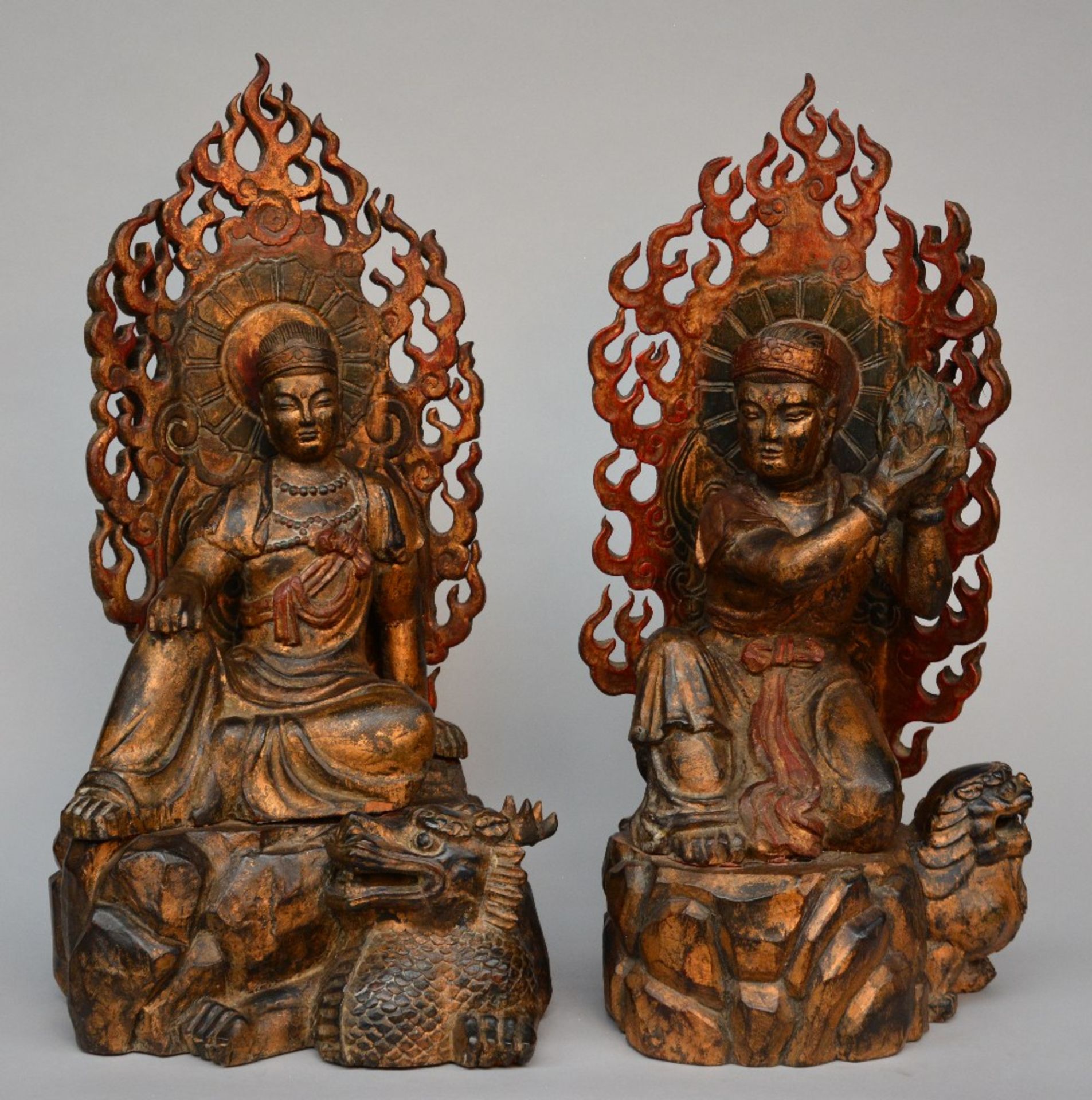 Two Oriental gilt wooden and polychromed Buddhist priests, H 70 - 72 cm