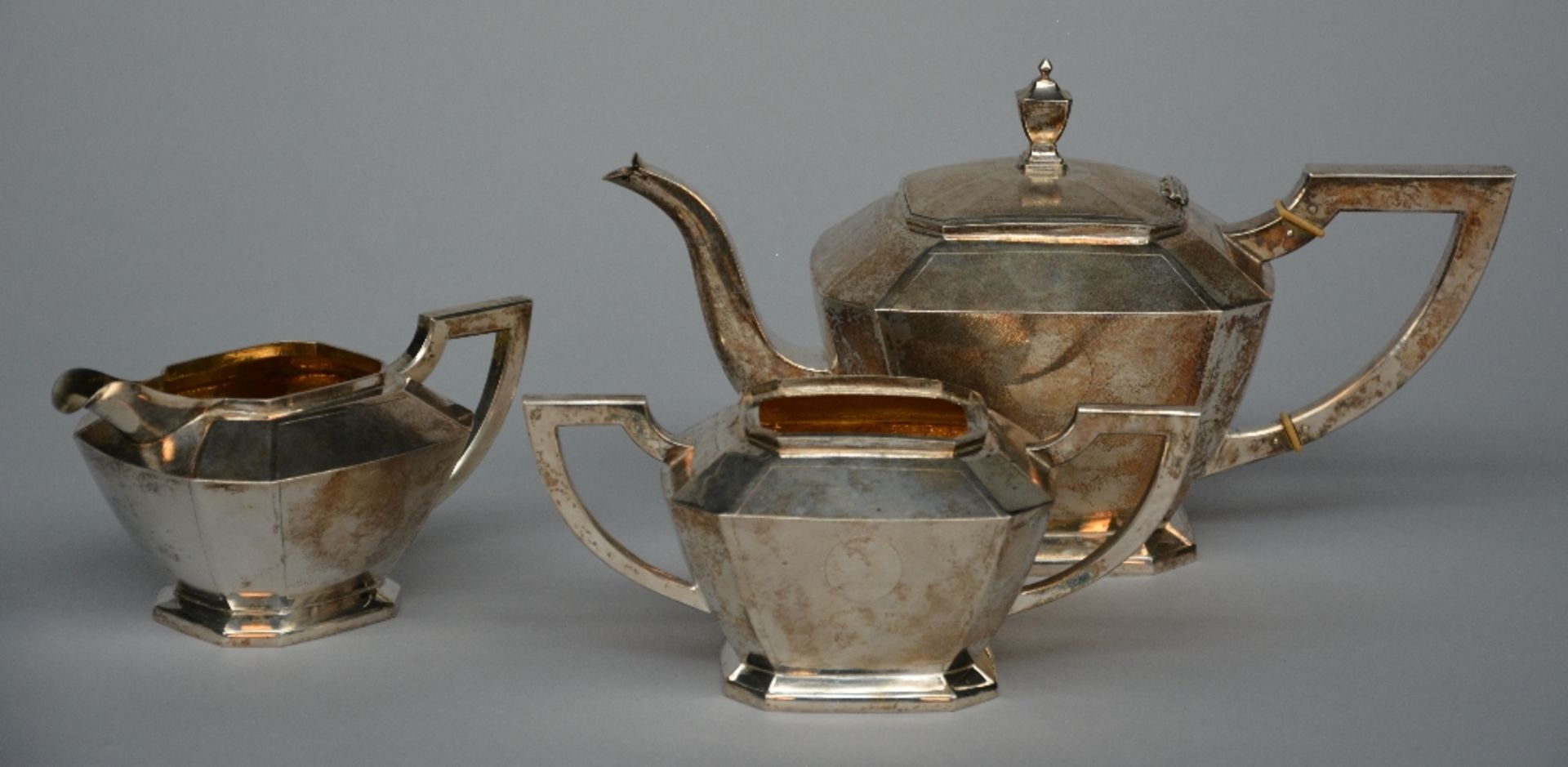 A Chinese silver three-piece tea set (925/100), H 16 - W 28 cm - Total weight: ca. 1123 g