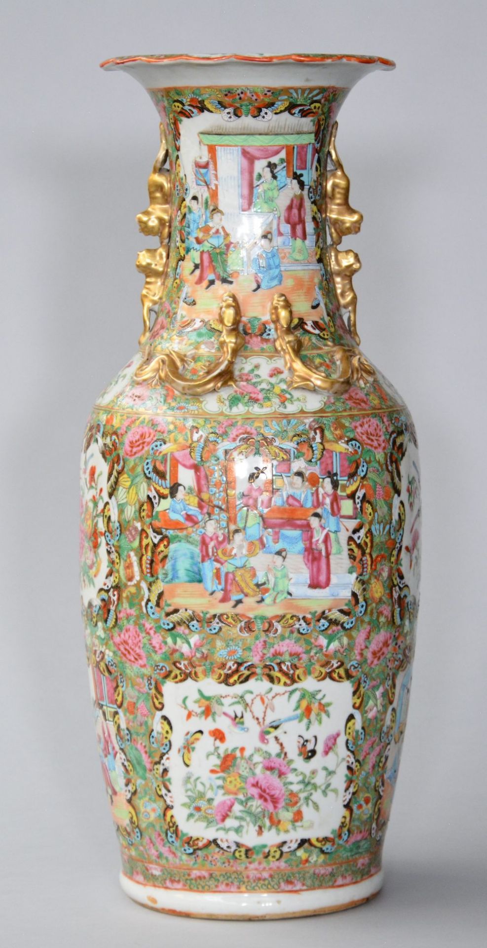 A Chinese Canton vase with relief decoration, 19thC, H 61,5 cm (firing fault in the neck, only