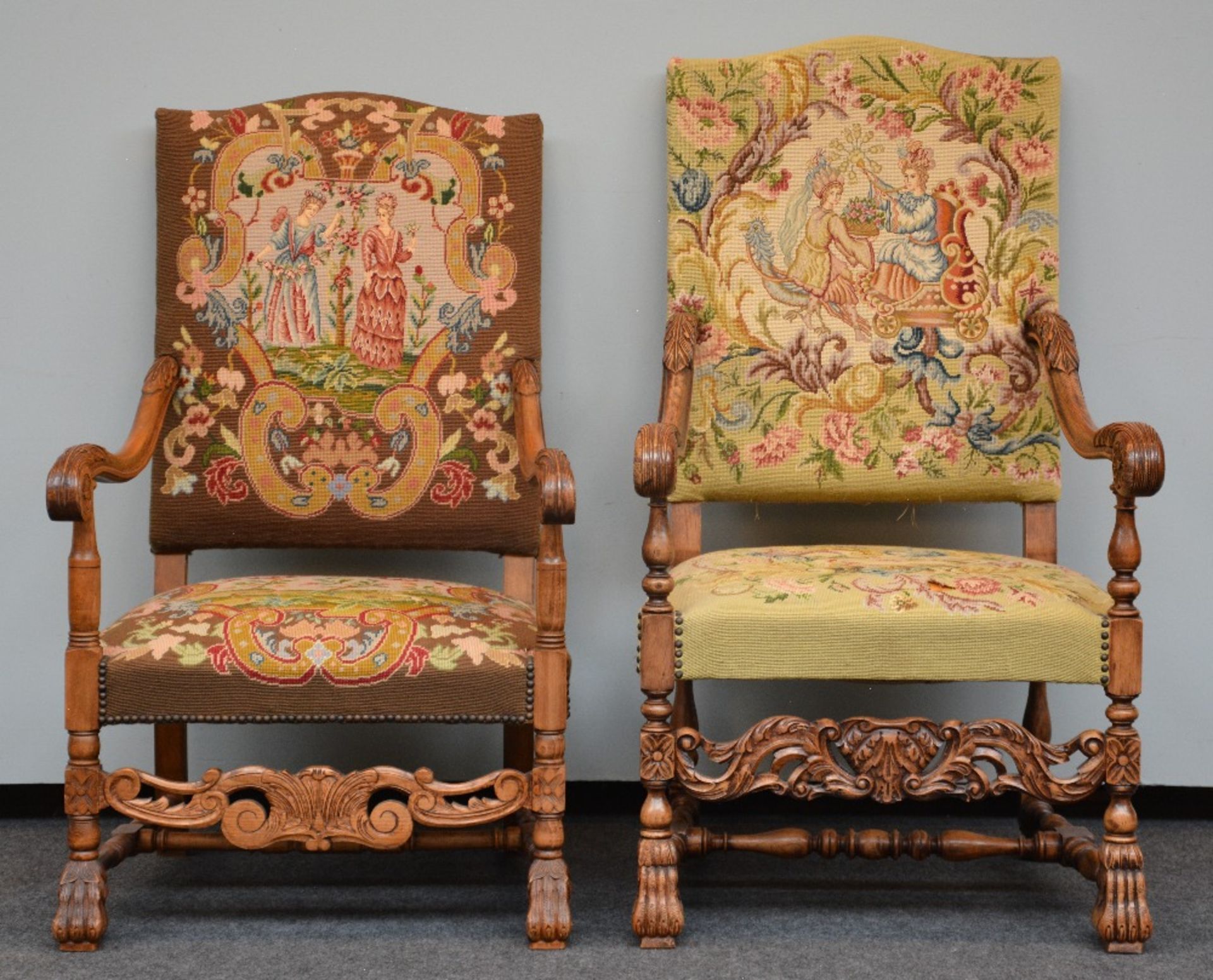 Two richly carved LXV-style armchairs with 'gros point' upholstery, H 111,5 / 119,5 - W 68 cm