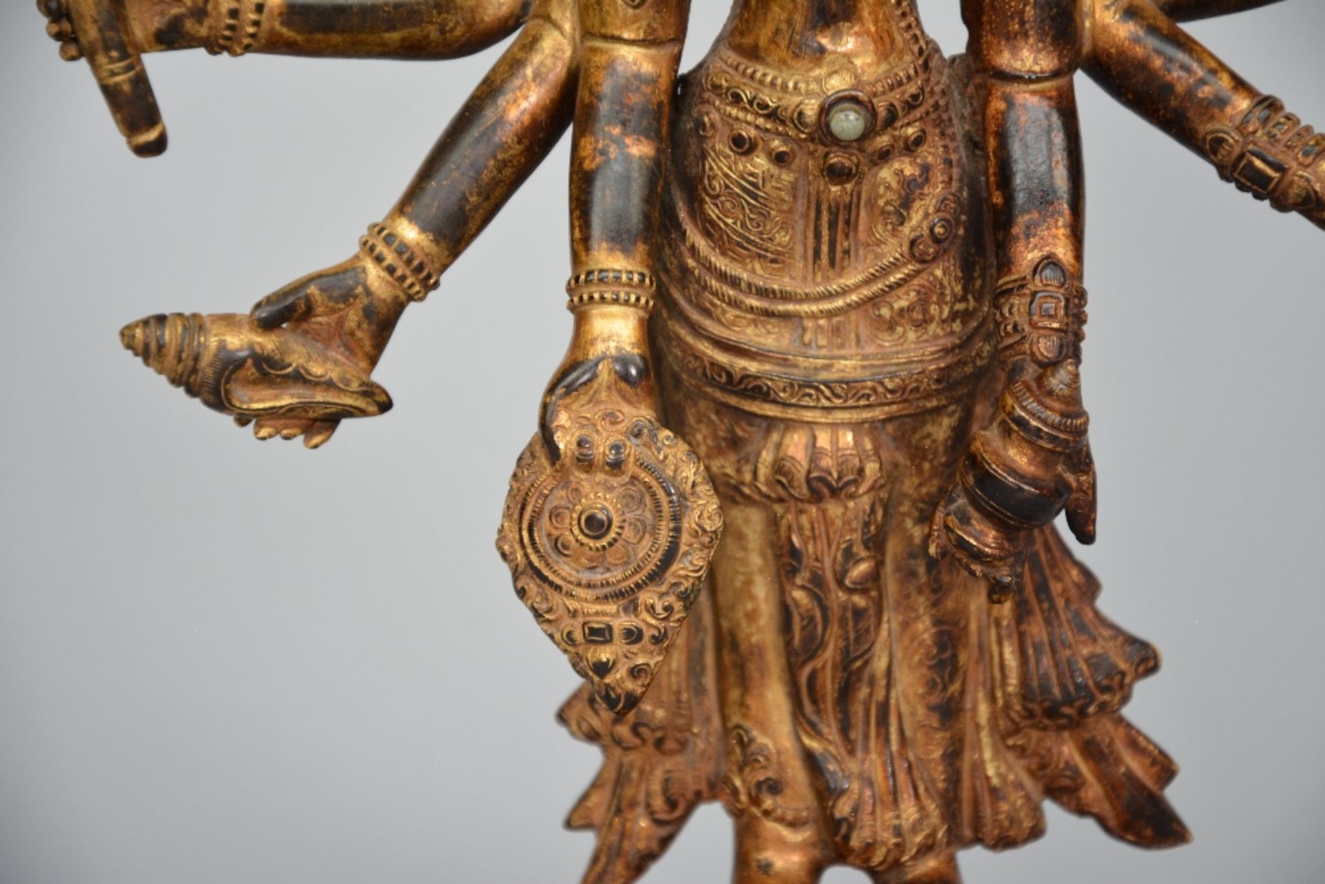 An Oriental gilt bronze polychrome figure, representing Shiva, decorated and inlaid with various - Image 4 of 9