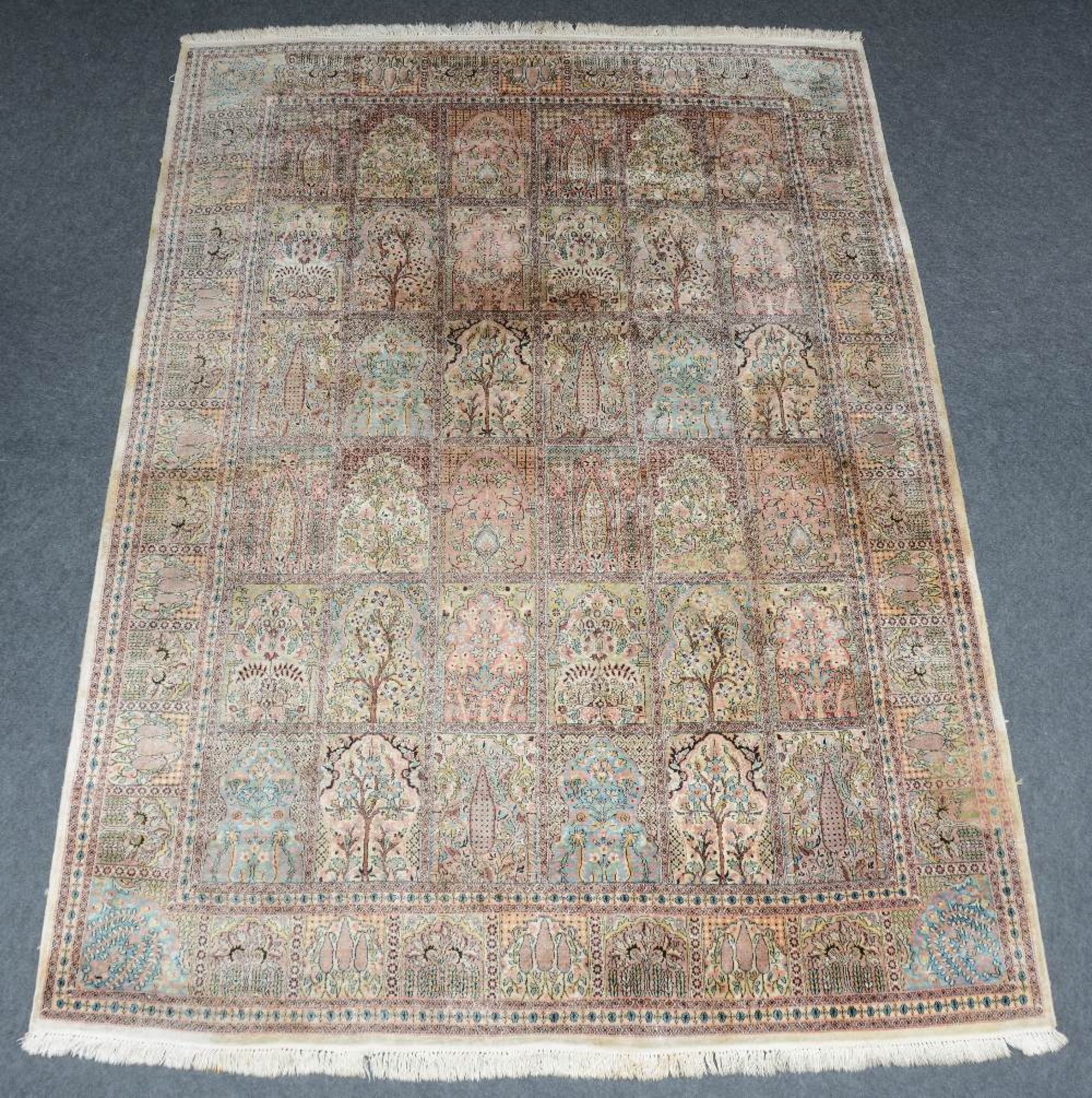 An Oriental rug, silk on cotton, 246 x 333