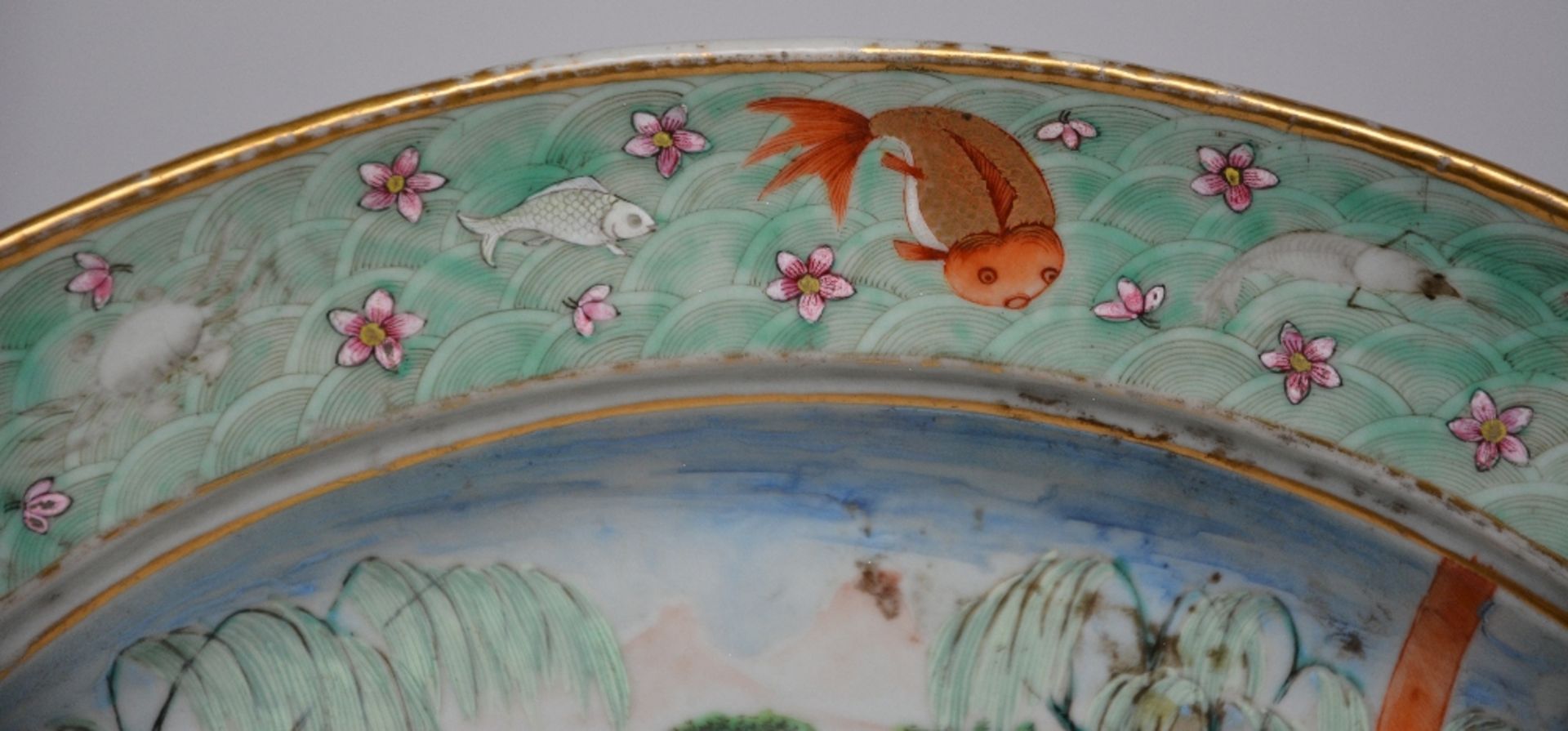 An exceptional Chinese oval dish, famille rose, decorated with a genre scene and fish, 18thC, H - Image 2 of 5