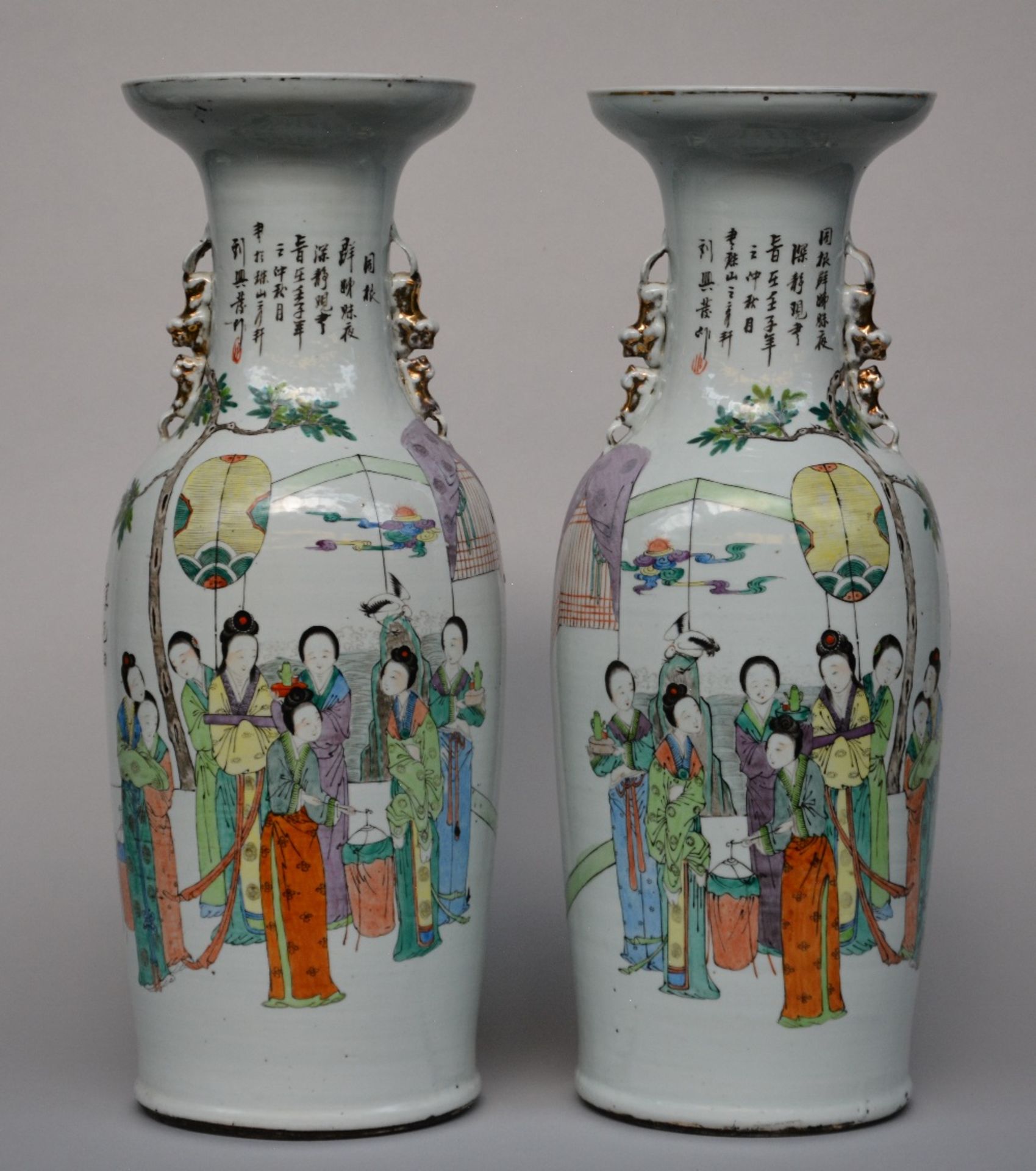 A fine pair of Chinese polychrome decorated vases, one side painted with a genre scene, the other