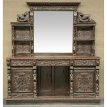 A richly carved oak late Victorian renaissance revival cupboard, H 200 - W 181,5 - D 66,5 cm