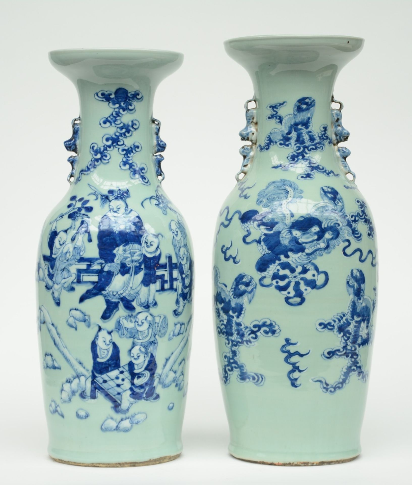 Two Chinese celadon ground blue and white vases, one decorated with children and one with Fu