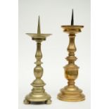 Two 17thC Low Countries pricket candlesticks, H 47,5 - 52,5 cm (some restoration)