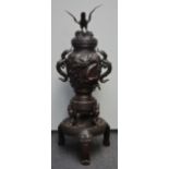 An impressive Japanese bronze incense burner with dragon relief decoration, late 19thC, H 141 cm