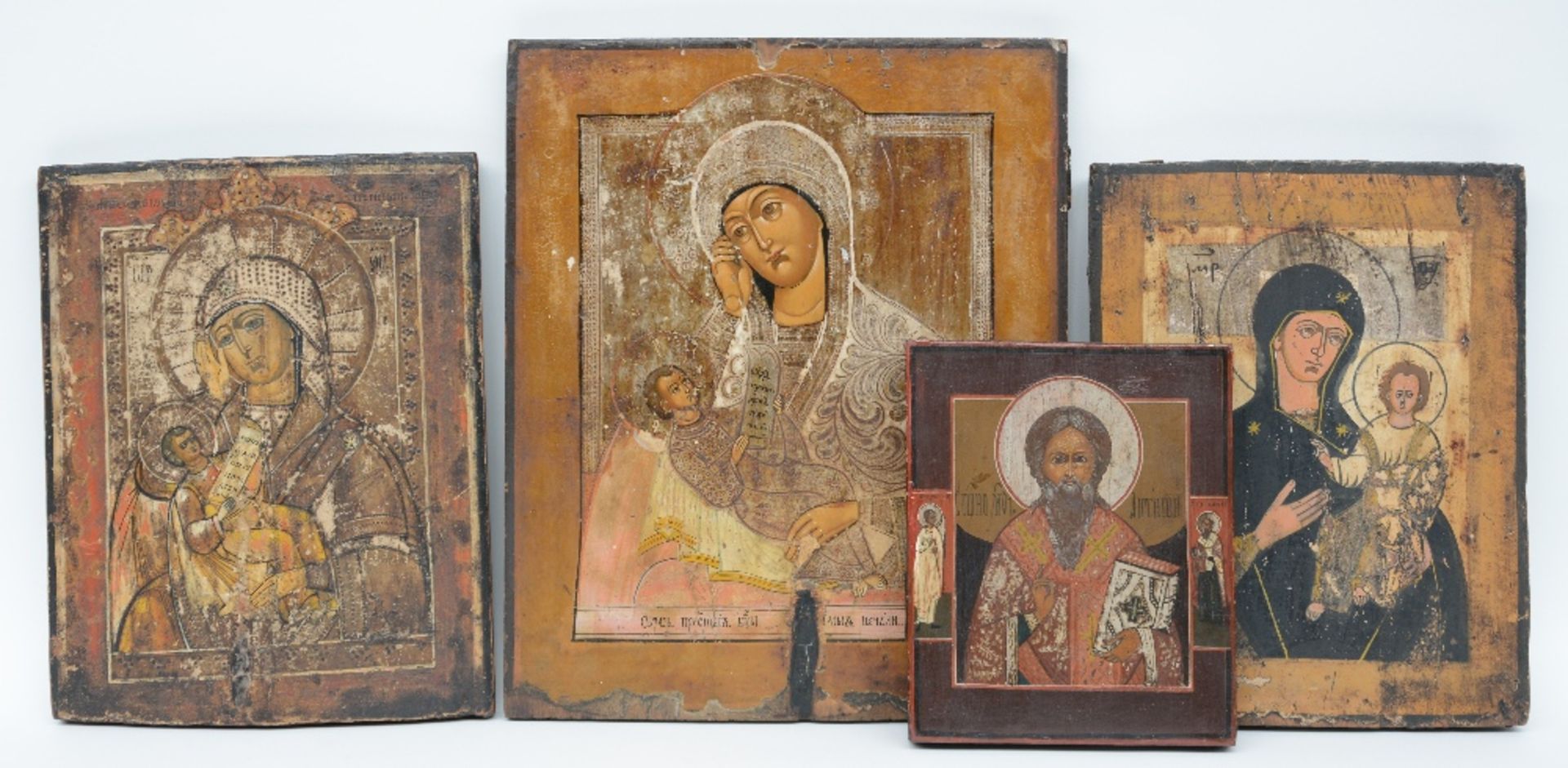 Four various Eastern European icons, 19thC and 20thC, The Holy Mother and Child (x2) - 'Mother of