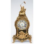 A rare cartel clock, tortoise shell veneered and with gilt bronze mounts, the dial marked 'Warin à