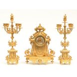An imposing Neoclassical gilt bronze garniture, last quarter 19thC, the dial marked 'B. Luppens -