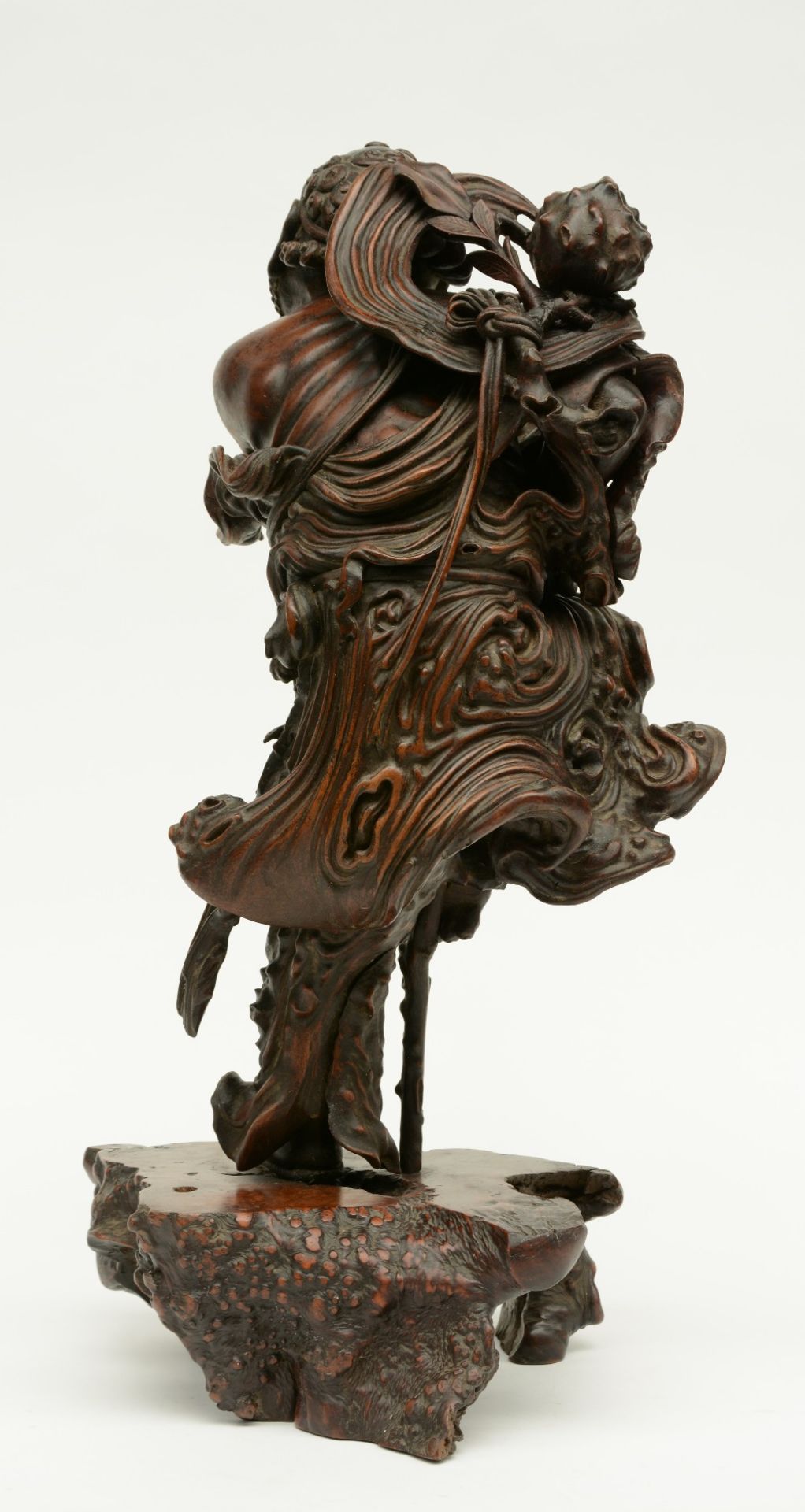 A Chinese walnut carved sculpture depicting a mythical figure, 19thC, H 64 cm (left indexfinger - Image 3 of 4