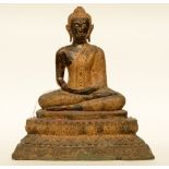 An Oriental gilt and polychrome decorated bronze Buddha, H 54 - W 51 cm (damage)