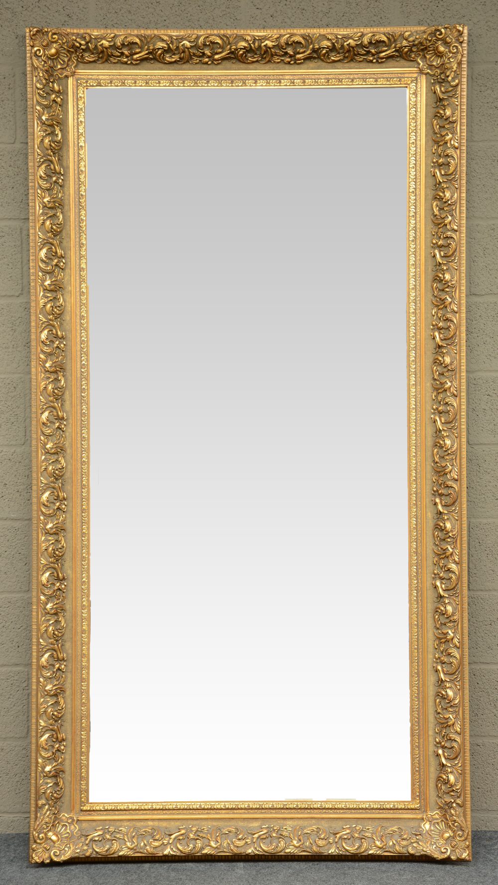 A gilt hall mirror, H 216,5 - 113,5 cm