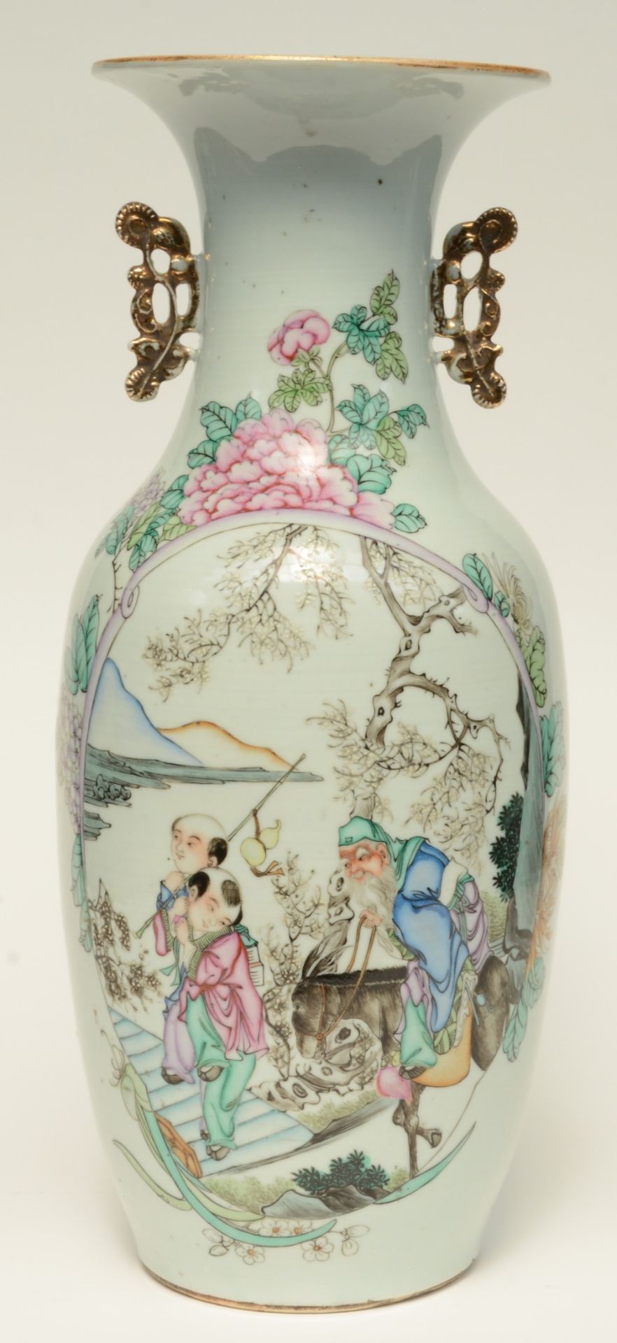 A Chinese polychrome decorated vase depicting a Sage with children, H 57 cm (starcrack on the