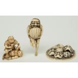 Three exceptional Edo period Japanese ivory katabori-netsuke, two in the form of kappa ('river