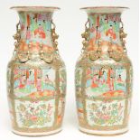 A pair of Chinese Canton vases with relief decorations, 19thC, H 45,5 cm (one vase with minor