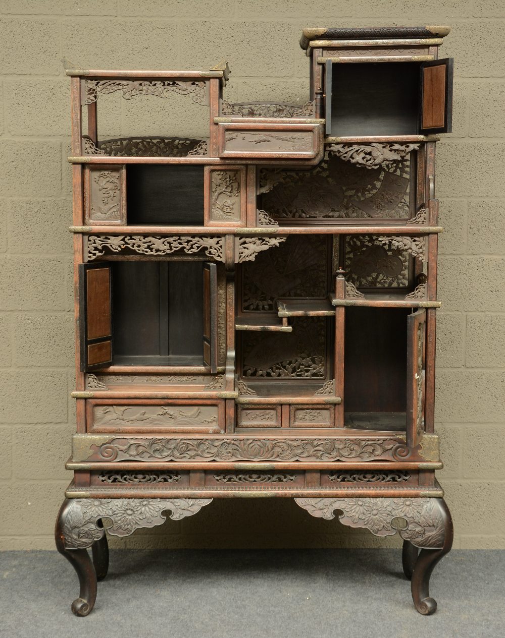 A Japanese wooden display cabinet, carved with birds, flowerbranches and a landscape, ca. 1900, H - Image 2 of 8