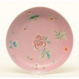 A Chinese pink ground relief moulded dish, decorated with flowers, marked Jaiqing, Diameter 24 cm