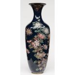 An impressive enamelled vase decorated with flowers , H 116 cm