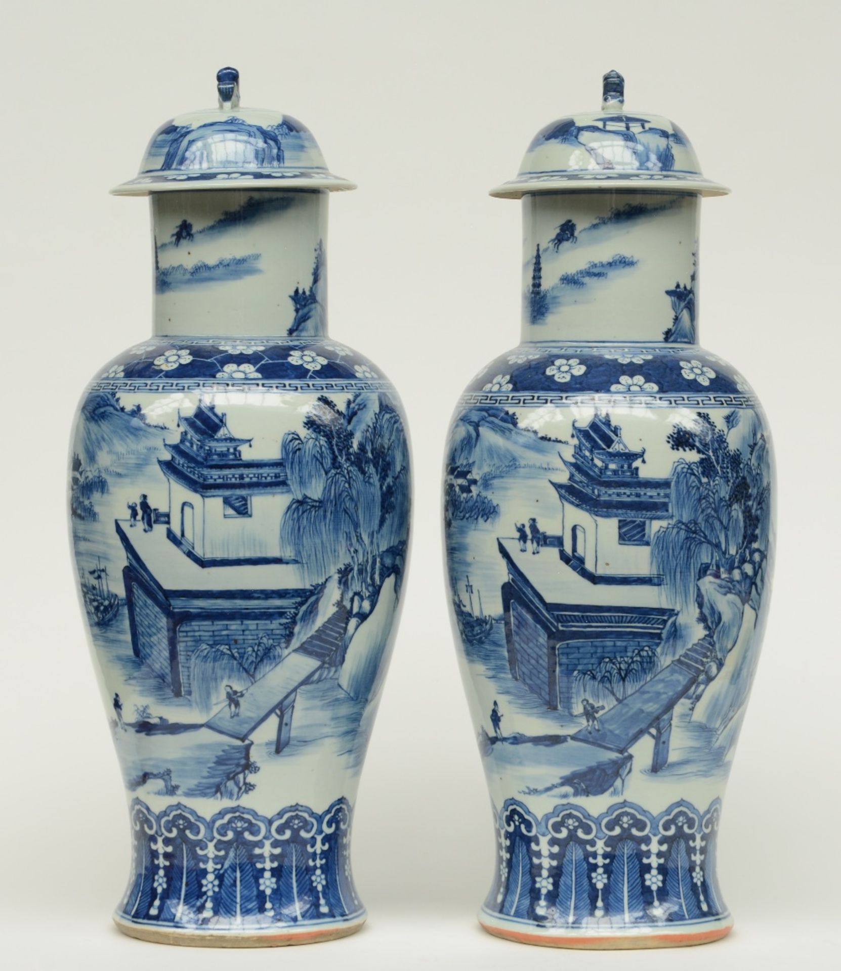 A pair of Chinese blue and white baluster shaped vases with cover, overall decorated with a river - Image 4 of 9