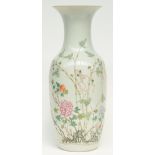 A Chinese famille rose vase decorated with flowerbranches, marked, H 59 cm (some flaking of the