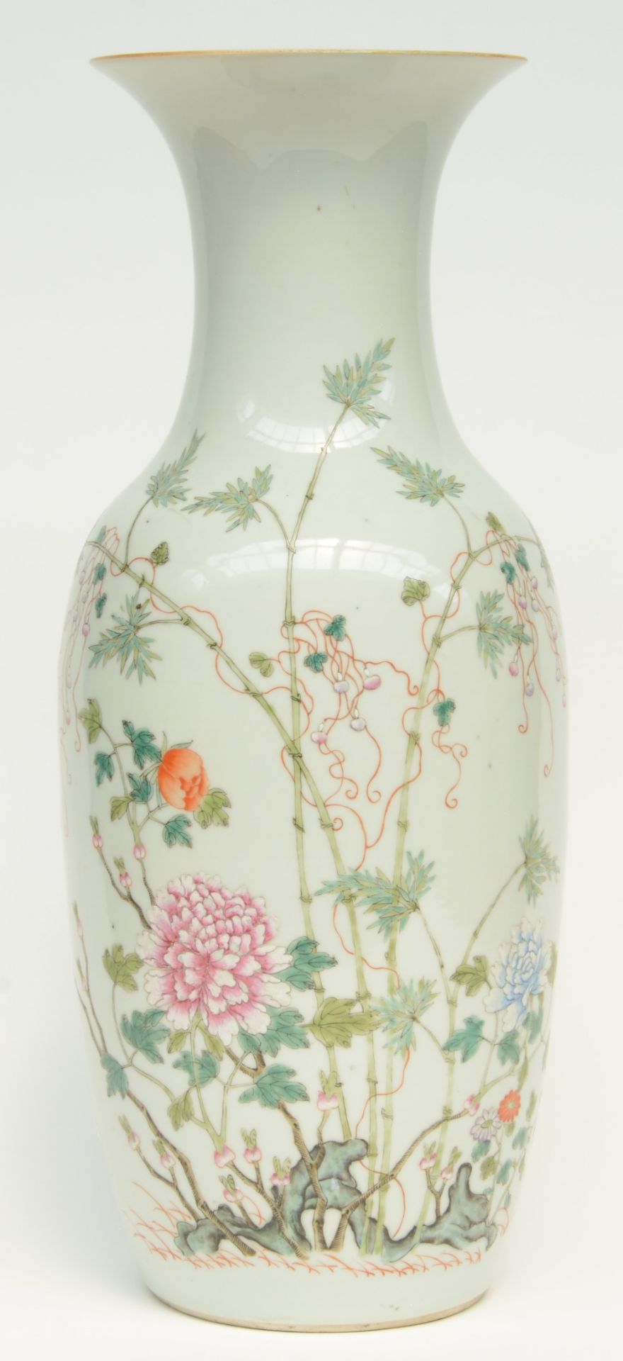 A Chinese famille rose vase decorated with flowerbranches, marked, H 59 cm (some flaking of the