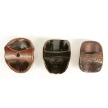 Three Japanese wooden mask netsuke, both signed; one in lacquer; all three late Edo-period, H 4 -