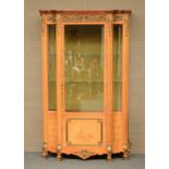 A charming Neoclassical display cabinet, mahogany veneerd and marquetry, bronze mounts, in the