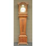 An early 19thC Neoclassical walnut longcase clock with brass mounts, the dial monogramed J.C.R., H