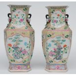 A pair of Chinese hexagonal famille rose vases, with relief decorations, depicting various birds