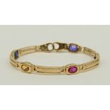 An 18ct gold bracelet, set with various gems, L 19 cm, Total weight: ca. 20,2 g