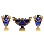 A rare cobalt blue crystal garniture with a fine Neoclassical ormolu mount, probably French, ca.