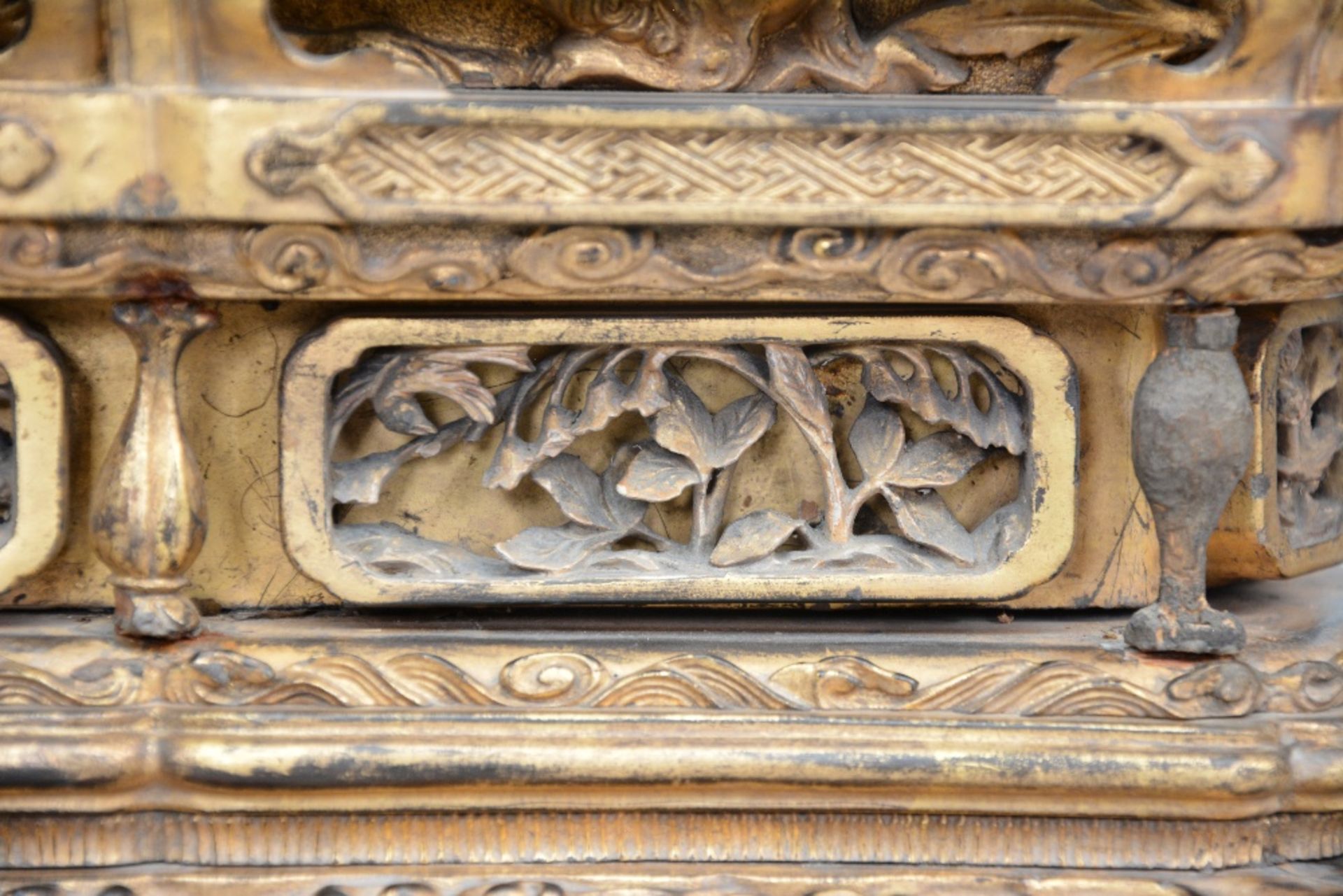 An 18thC Oriental gilt wooden temple with two sitting Buddha's on lotus seat and rich carvings, H 60 - Bild 9 aus 10